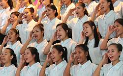 Students singing at graduation
